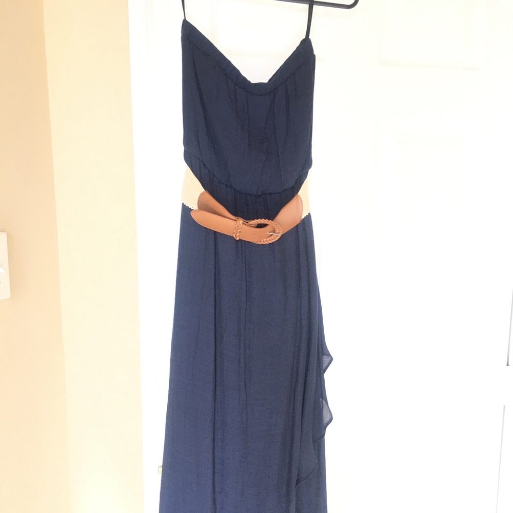 VISITING: Ruffled, strapless maxi